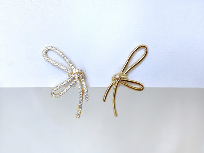 Mismatched sparkly bowknot clip on earrings