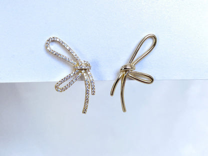 Mismatched sparkly bowknot clip on earrings