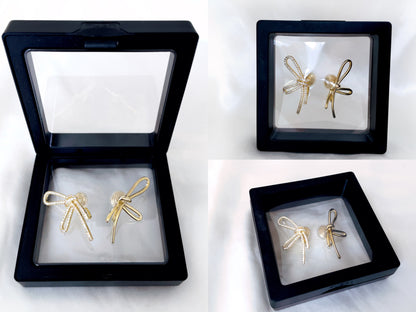 Mismatched sparkly bowknot clip on earrings