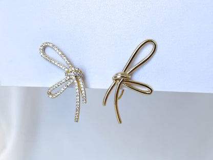 Mismatched sparkly bowknot clip on earrings