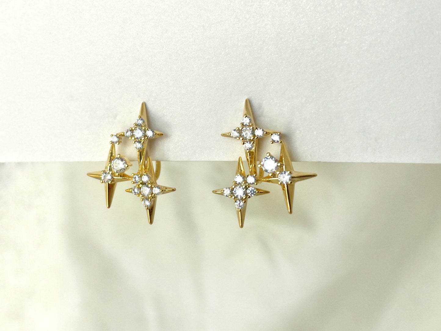 Sparkly CZ stars gold clip on earrings, Four point star clip on studs, Dainty three stars earrings, Invisible clip on earrings