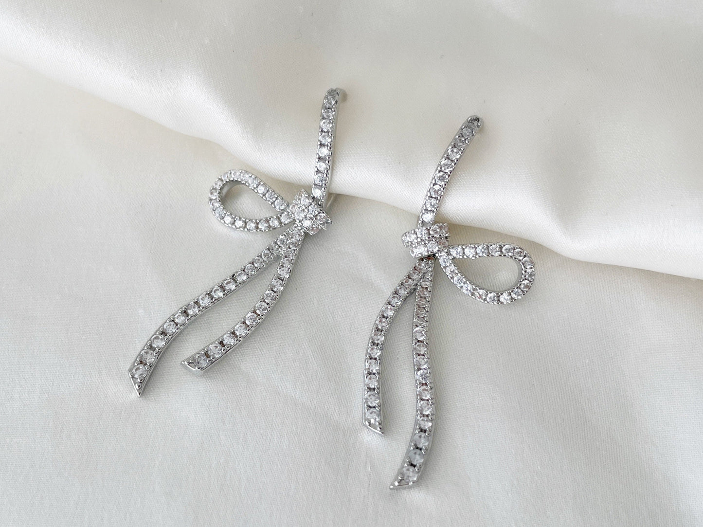Sparkling CZ Crystal Ribbon Bow Silver Dangle Clip on Earrings